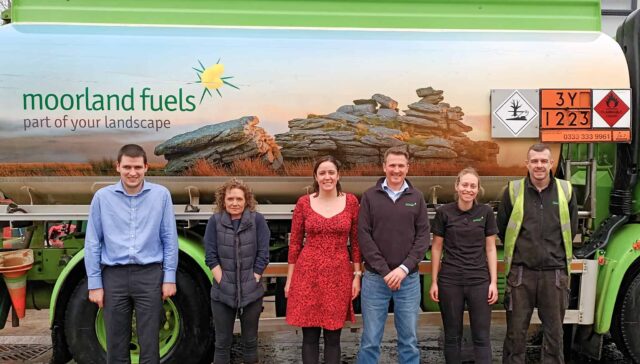 Some of the moorland fuels team members stood infront of one of the small fuel tankers