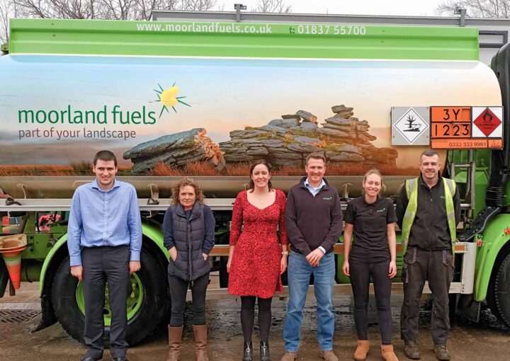 Some of the moorland fuels team members stood infront of one of the small fuel tankers