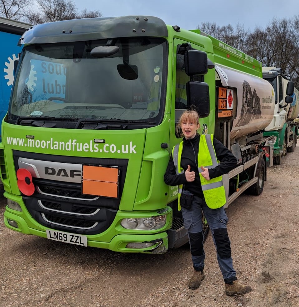 Picture of Moorland Fuels driver Kerry Parsons infront of her tanker.