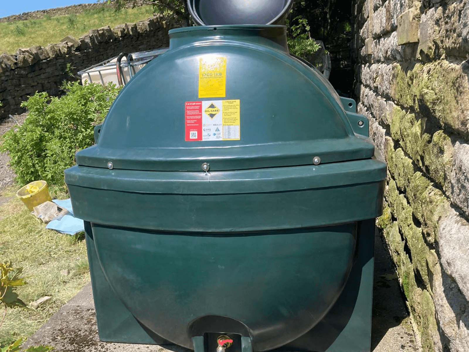 green-round-tank-in-garden
