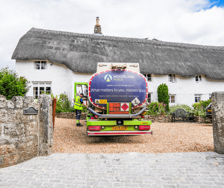 A Moorland Fuels Tanker Outside a property.