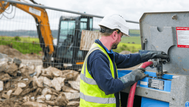A Moorland Fuels Driver delivering White Diesel to a construction site.